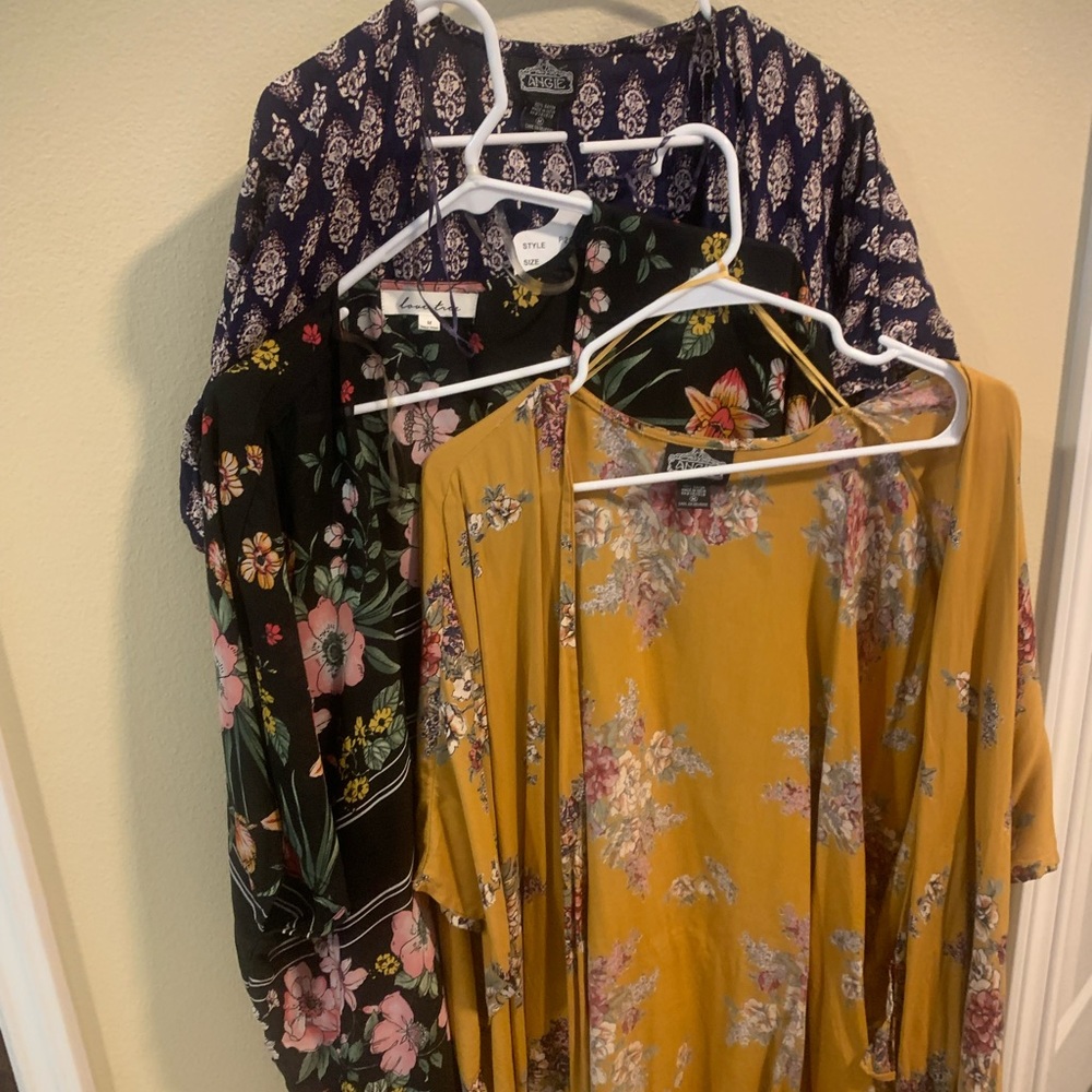 3 cover-ups. 2 barely used and 1 new with tags.